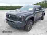 2024 Toyota Tacoma TRD Off Road with VIN 3TMLB5JN9RM060836, listed as a IAAI auction lot 43181595 with 21,563 mi miles and . Bid and sale history available at DreamBid. Image 2.