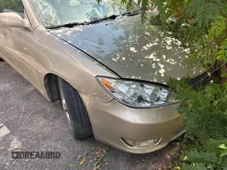 2005 Toyota Camry SE with VIN 4T1BA32K05U074598, listed as a IAAI auction lot 43259382 with 119,170 mi miles and . Bid and sale history available at DreamBid. Image 1.