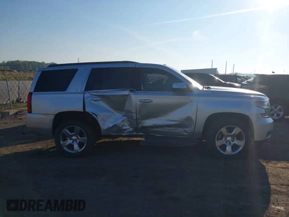 2016 Chevrolet Tahoe LT with VIN 1GNSCBKC4GR468815, listed as a IAAI auction lot 43223810 with 136,753 mi miles and . Bid and sale history available at DreamBid. Image 13.