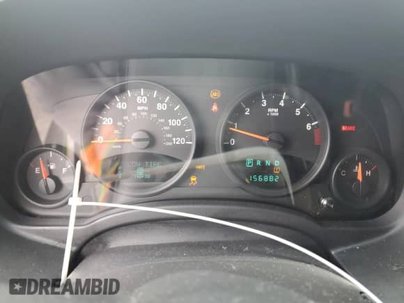 2011 Jeep Compass с VIN 1J4NF1FB3BD258974, выставлен на аукционе Copart как лот 85819335 с пробегом 156 882 миль миль и Списание • Salvage title. История ставок и продаж доступна на DreamBid. Изображение 9.