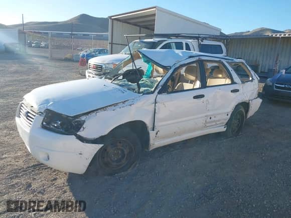 2008 Subaru Forester X with VIN JF1SG63698H718737, listed as a IAAI auction lot 43373758 with 175,552 mi miles and . Bid and sale history available at DreamBid. Image 2.