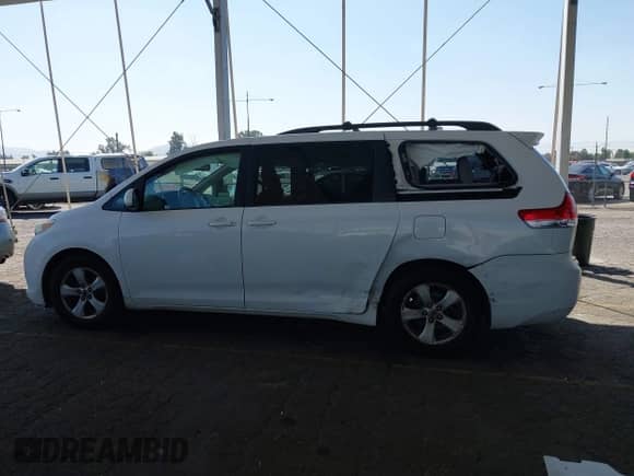 2012 Toyota Sienna LE AAS with VIN 5TDKK3DC9CS274467, listed as a IAAI auction lot 43309620 with 258,543 mi miles and . Bid and sale history available at DreamBid. Image 13.
