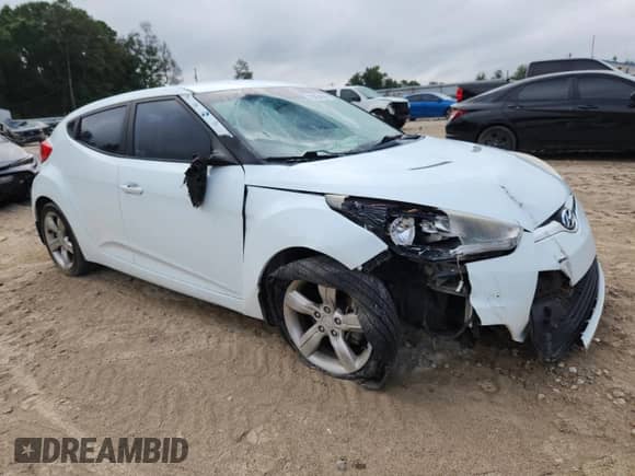 2013 Hyundai Veloster w/Gray Int z VIN KMHTC6AD7DU086801, wystawiony jako Copart lot #83954585 z przebiegiem 139 538 mil mil oraz Szkoda całkowita • Salvage title. Historia ofert i sprzedaży dostępna na DreamBid. Obrazek 4.