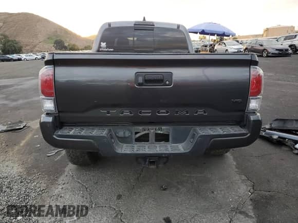 2021 Toyota Tacoma SR5 с VIN 3TMDZ5BN2MM108586, выставлен на аукционе Copart как лот 84925984 с пробегом 112 793 миль миль и Списание • Salvage title. История ставок и продаж доступна на DreamBid. Изображение 6.