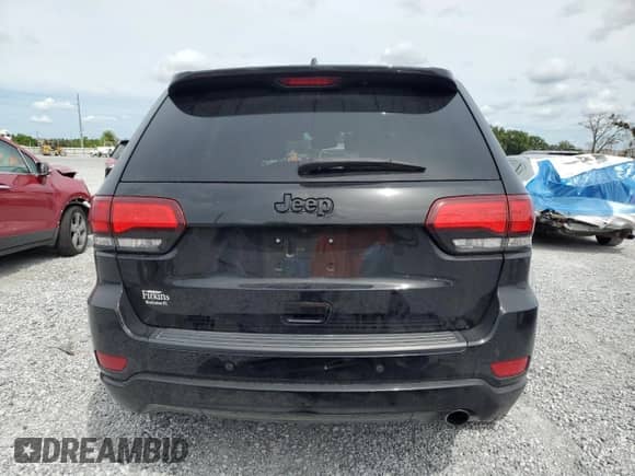 2020 Jeep Grand Cherokee Laredo E with VIN 1C4RJEAG0LC365312, listed as a Copart auction lot 81399395 with 81,030 mi miles and Salvage title. Bid and sale history available at DreamBid. Image 6.