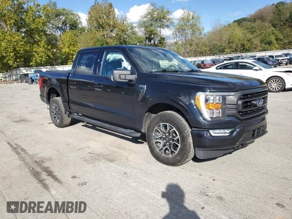 2021 Ford F-150 XLT z VIN 1FTEW1EP9MKD97833, wystawiony jako Copart lot #82365345 z przebiegiem 69 770 mil mil oraz Szkoda całkowita • Salvage title. Historia ofert i sprzedaży dostępna na DreamBid. Obrazek 4.
