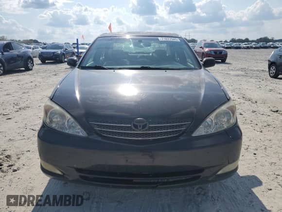 2003 Toyota Camry XLE с VIN 4T1BE30K33U181715, выставлен на аукционе Copart как лот 71077945 с пробегом 233 892 миль миль и Списание • Salvage title. История ставок и продаж доступна на DreamBid. Изображение 5.