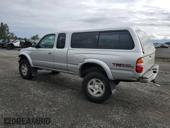 2004 Toyota Tacoma with VIN 5TEWN72N44Z310476, listed as a Copart auction lot 84521845 with 267,368 mi miles and Salvage title. Bid and sale history available at DreamBid. Image 2.