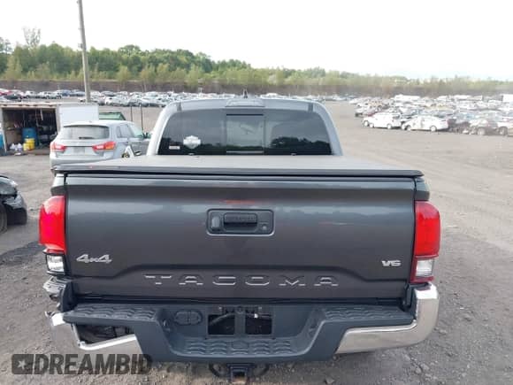 2021 Toyota Tacoma SR with VIN 3TMCZ5AN7MM383352, listed as a IAAI auction lot 43246296 with 44,937 mi miles and . Bid and sale history available at DreamBid. Image 16.