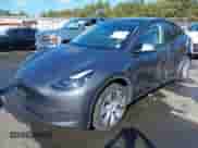 2023 Tesla Model Y Long Range with VIN 7SAYGDEE4PA192738, listed as a IAAI auction lot 43364402 with 14,872 mi miles and . Bid and sale history available at DreamBid. Image 20.