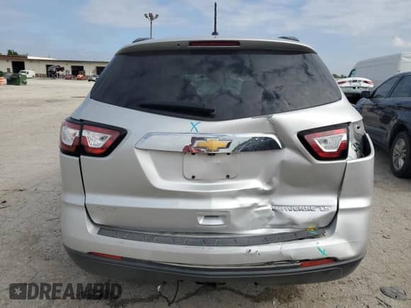 2014 Chevrolet Traverse LS with VIN 1GNKRFKD5EJ235200, listed as a Copart auction lot 68420555 with 141,018 mi miles and Salvage title. Bid and sale history available at DreamBid. Image 6.