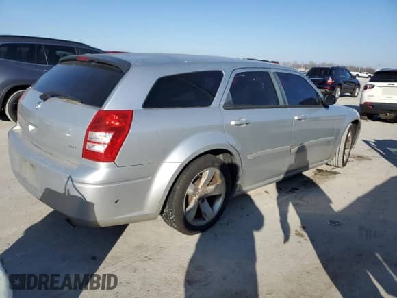 2005 Dodge Magnum SE с VIN 2D4FV48V65H186409, выставлен на аукционе Copart как лот 86053894 с пробегом 264 186 миль миль и Списание • Salvage title. История ставок и продаж доступна на DreamBid. Изображение 3.