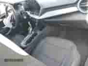 2024 Chevrolet Trax LS with VIN KL77LFE24RC208412, listed as a IAAI auction lot 42842056 with 26,959 mi miles and . Bid and sale history available at DreamBid. Image 5.