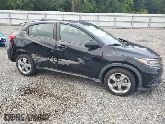 2019 Honda HR-V LX с VIN 3CZRU5H31KM705813, выставлен на аукционе Copart как лот 80371725 с пробегом 83 261 миль миль и Списание • Salvage title. История ставок и продаж доступна на DreamBid. Изображение 4.