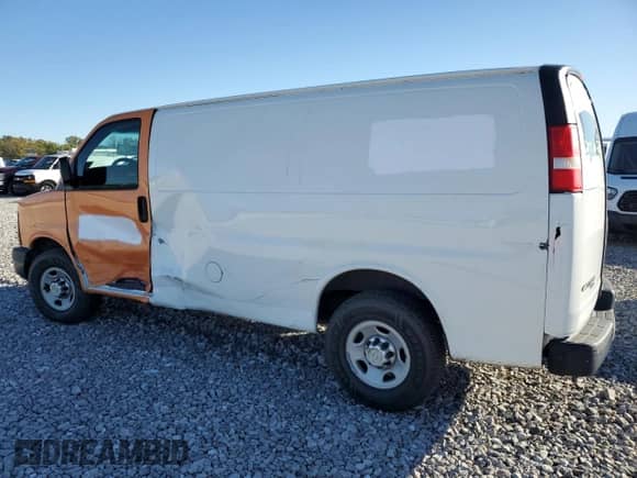 2013 Chevrolet Express Cargo with VIN 1GCWGFBA9D1180058, listed as a Copart auction lot 63494745 with 163,668 mi miles and Salvage title. Bid and sale history available at DreamBid. Image 2.