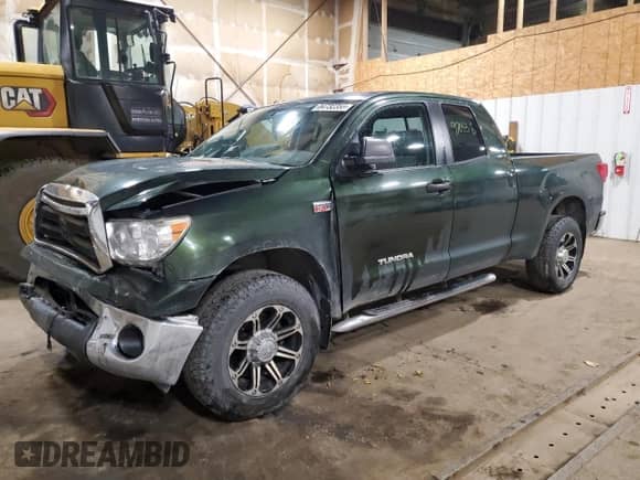 2011 Toyota Tundra с VIN 5TFUY5F14BX174154, выставлен на аукционе Copart как лот 84732355 с пробегом 97 053 миль миль и Списание • Salvage title. История ставок и продаж доступна на DreamBid. Изображение 1.