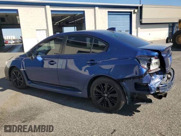 2015 Subaru WRX Premium with VIN JF1VA1F62F9821793, listed as a Copart auction lot 69109125 with 114,632 mi miles and Salvage title. Bid and sale history available at DreamBid. Image 2.