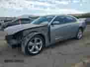 2014 Dodge Charger SXT with VIN 2C3CDXHG4EH305245, listed as a Copart auction lot 84276865 with 166,681 mi miles and Salvage title. Bid and sale history available at DreamBid. Image 1.