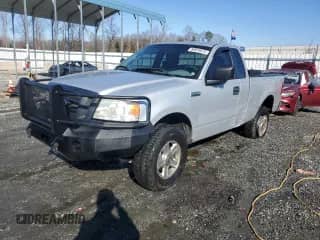 2005 Ford F-150 XL with VIN 1FTRF14535NB98598, listed as a Copart auction lot 88928675 with 214,304 mi miles and Salvage title. Bid and sale history available at DreamBid. Image 1.