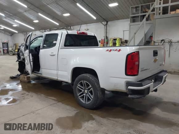 2020 Chevrolet Colorado 4WD Work Truck with VIN 1GCGTBEN1L1160859, listed as a IAAI auction lot 42605808 with 61,852 mi miles and . Bid and sale history available at DreamBid. Image 3.