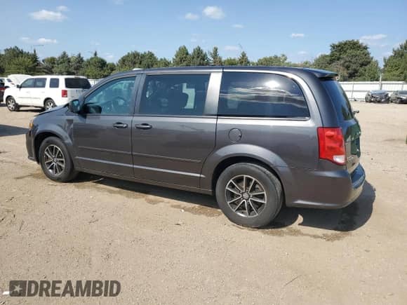 2016 Dodge Grand Caravan American Value with VIN 2C4RDGBG0GR252054, listed as a Copart auction lot 71838825 with 128,684 mi miles and Salvage title. Bid and sale history available at DreamBid. Image 2.
