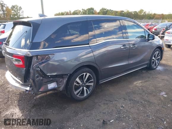 2018 Honda Odyssey Elite z VIN 5FNRL6H91JB071957, wystawiony jako IAAI lot #43506915 z przebiegiem 75 656 mil mil oraz . Historia ofert i sprzedaży dostępna na DreamBid. Obrazek 4.
