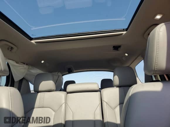 2023 Honda Pilot Touring с VIN 5FNYG1H71PB039231, выставлен на аукционе Copart как лот 61742805 с пробегом 39 920 миль миль и Списание • Salvage title. История ставок и продаж доступна на DreamBid. Изображение 10.