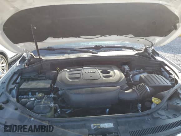 2018 Jeep Grand Cherokee Laredo E with VIN 1C4RJEAG3JC340000, listed as a Copart auction lot 58134555 with 202,491 mi miles and Salvage title. Bid and sale history available at DreamBid. Image 12.