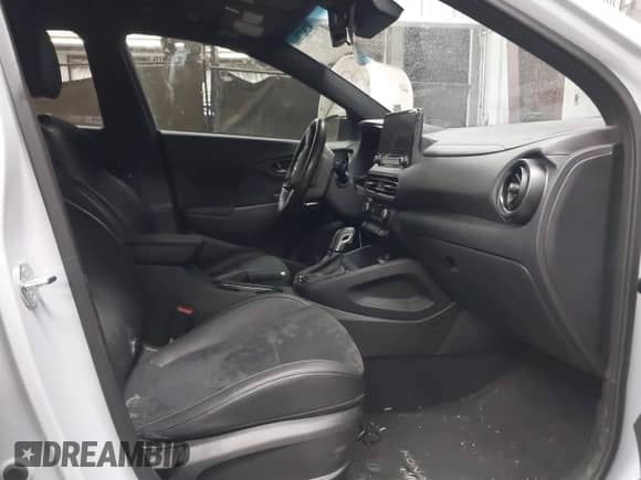 2023 Hyundai Kona with VIN KM8KH3AC9PU009337, listed as a IAAI auction lot 42827068 with 40,513 mi miles and . Bid and sale history available at DreamBid. Image 5.