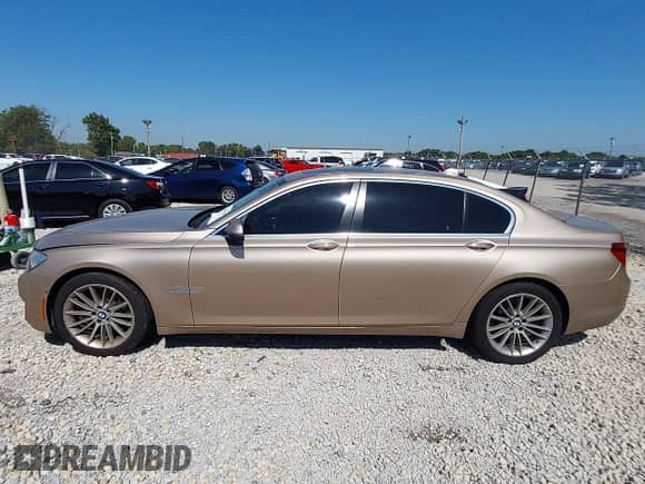 2013 BMW 7 Series 750Li xDrive with VIN WBAYF8C52DD141011, listed as a IAAI auction lot 43241297 with 183,579 mi miles and . Bid and sale history available at DreamBid. Image 14.
