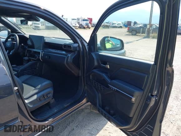 2024 Toyota Tacoma TRD Off Road with VIN 3TMLB5JN7RM069938, listed as a IAAI auction lot 43056789 with 6,837 mi miles and . Bid and sale history available at DreamBid. Image 5.