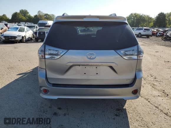 2015 Toyota Sienna SE with VIN 5TDXK3DC0FS567474, listed as a Copart auction lot 80295615 with 93,112 mi miles and Salvage title. Bid and sale history available at DreamBid. Image 6.