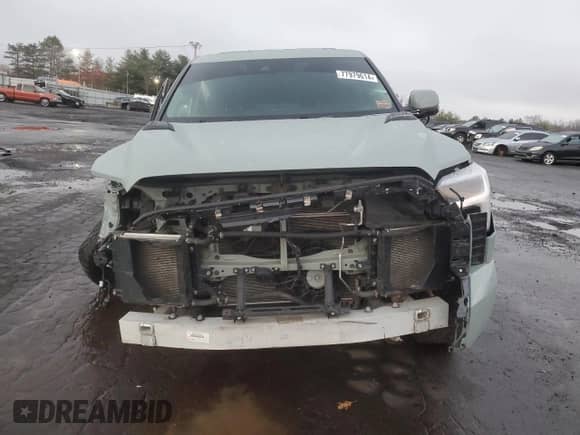 2023 Toyota Tundra Limited Hybrid with VIN 5TFJC5EC1PX002952, listed as a Copart auction lot 77979614 with Not provided miles and Salvage title. Bid and sale history available at DreamBid. Image 5.