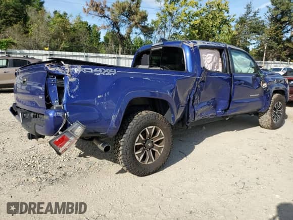 2022 Toyota Tacoma SR5 with VIN 3TYDZ5BN0NT005849, listed as a Copart auction lot 71113125 with 63,449 mi miles and Salvage title. Bid and sale history available at DreamBid. Image 3.