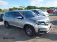 2020 Honda Pilot EX z VIN 5FNYF5H39LB019780, wystawiony jako IAAI lot #41063655 z przebiegiem 148 023 mil mil oraz . Historia ofert i sprzedaży dostępna na DreamBid. Obrazek 1.