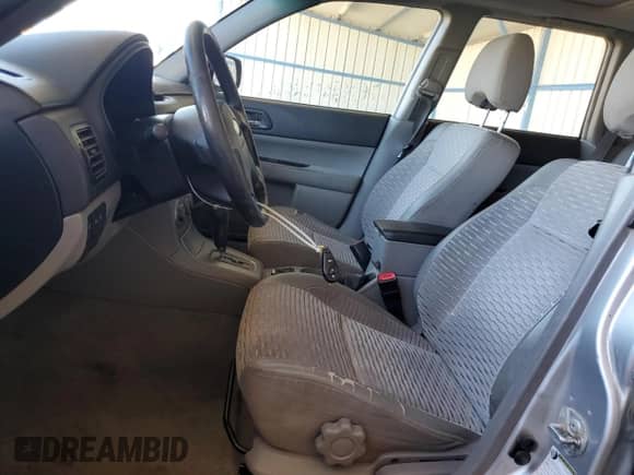 2004 Subaru Forester XS with VIN JF1SG65694H734329, listed as a Copart auction lot 82090665 with 235,570 mi miles and Salvage title. Bid and sale history available at DreamBid. Image 7.