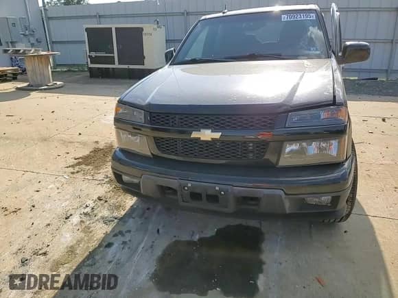 2012 Chevrolet Colorado 1LT z VIN 1GCHTCFE5C8167717, wystawiony jako Copart lot #70923195 z przebiegiem 161 738 mil mil oraz Szkoda całkowita • Salvage title. Historia ofert i sprzedaży dostępna na DreamBid. Obrazek 13.
