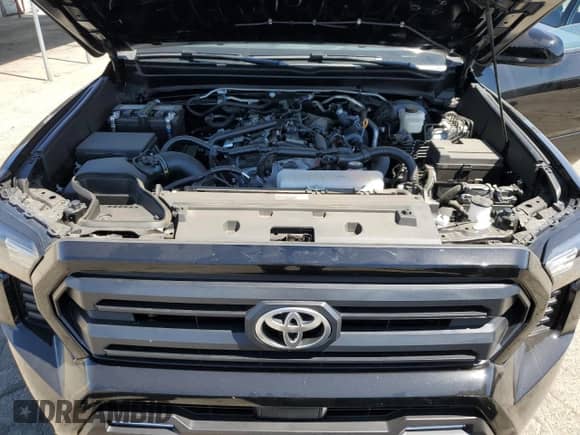 2024 Toyota Tacoma SR5 with VIN 3TMLB5JNXRM054298, listed as a Copart auction lot 66528135 with 5,976 mi miles and Salvage title. Bid and sale history available at DreamBid. Image 11.