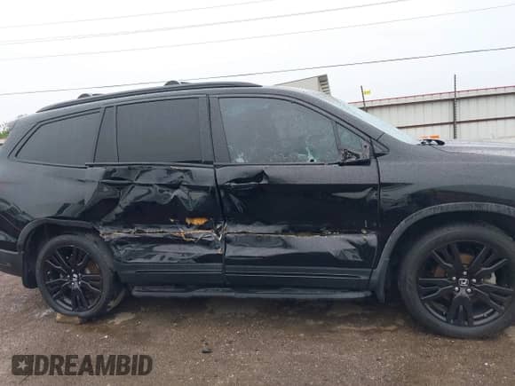 2020 Honda Pilot Black Edition z VIN 5FNYF6H74LB007108, wystawiony jako IAAI lot #42200354 z przebiegiem 113 489 mil mil oraz . Historia ofert i sprzedaży dostępna na DreamBid. Obrazek 13.