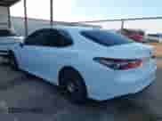 2021 Toyota Camry Hybrid LE with VIN 4T1C31AK3MU560440, listed as a IAAI auction lot 43202632 with 65,038 mi miles and . Bid and sale history available at DreamBid. Image 3.