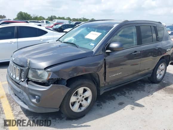 2016 Jeep Compass Latitude with VIN 1C4NJCEA4GD550410, listed as a IAAI auction lot 42442054 with 148,385 mi miles and . Bid and sale history available at DreamBid. Image 2.