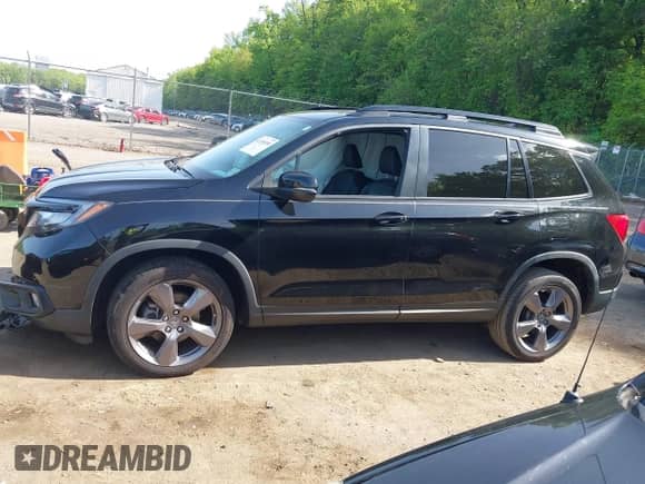 2021 Honda Passport Touring z VIN 5FNYF8H96MB014947, wystawiony jako IAAI lot #42150399 z przebiegiem 47 499 mil mil oraz . Historia ofert i sprzedaży dostępna na DreamBid. Obrazek 14.