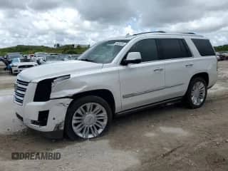 2017 Cadillac Escalade Platinum with VIN 1GYS4DKJ6HR275061, listed as a Copart auction lot 60665235 with 101,458 mi miles and Salvage title. Bid and sale history available at DreamBid. Image 1.
