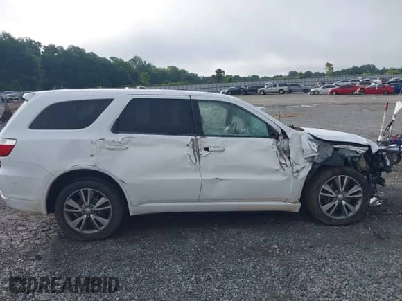 2013 Dodge Durango R/T with VIN 1C4SDHCT4DC648639, listed as a IAAI auction lot 42504044 with 193,909 mi miles and . Bid and sale history available at DreamBid. Image 13.