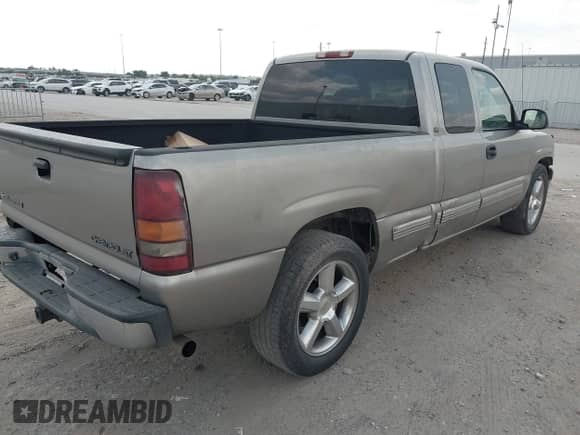 2002 Chevrolet Silverado 1500 LS with VIN 2GCEC19T221270290, listed as a IAAI auction lot 43084494 with 126,807 mi miles and . Bid and sale history available at DreamBid. Image 4.