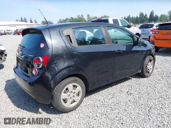 2013 Chevrolet Sonic LS with VIN 1G1JB6SG0D4252673, listed as a IAAI auction lot 42579480 with 161,686 mi miles and . Bid and sale history available at DreamBid. Image 4.