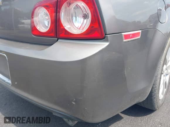 2012 Chevrolet Malibu LTZ z VIN 1G1ZG5E77CF164975, wystawiony jako IAAI lot #42513864 z przebiegiem 195 299 mil mil oraz . Historia ofert i sprzedaży dostępna na DreamBid. Obrazek 6.