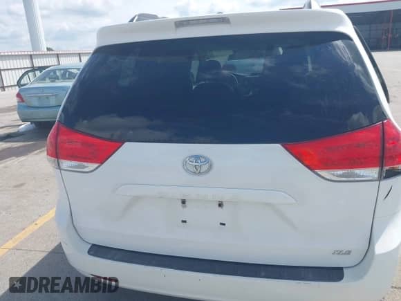 2011 Toyota Sienna XLE AAS with VIN 5TDYK3DC5BS160068, listed as a IAAI auction lot 43037864 with 152,020 mi miles and . Bid and sale history available at DreamBid. Image 16.