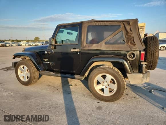 2008 Jeep Wrangler Sahara с VIN 1J8FA54158L589606, выставлен на аукционе Copart как лот 82117285 с пробегом 143 741 миль миль и Чистый • Clean title. История ставок и продаж доступна на DreamBid. Изображение 2.