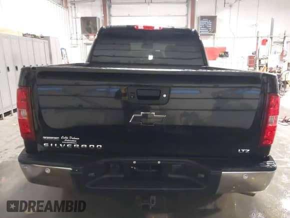 2011 Chevrolet Silverado 1500 LTZ with VIN 3GCPKTE33BG361069, listed as a IAAI auction lot 41274810 with 302,715 mi miles and . Bid and sale history available at DreamBid. Image 16.